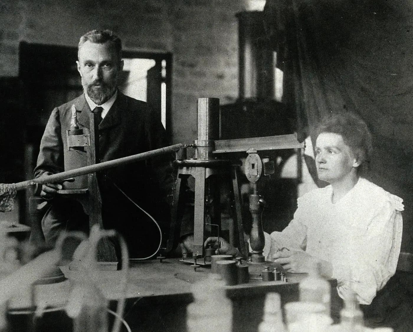 Pierre and Marie Curie with their apparatus for measuring radioactivity in their Paris laboratory