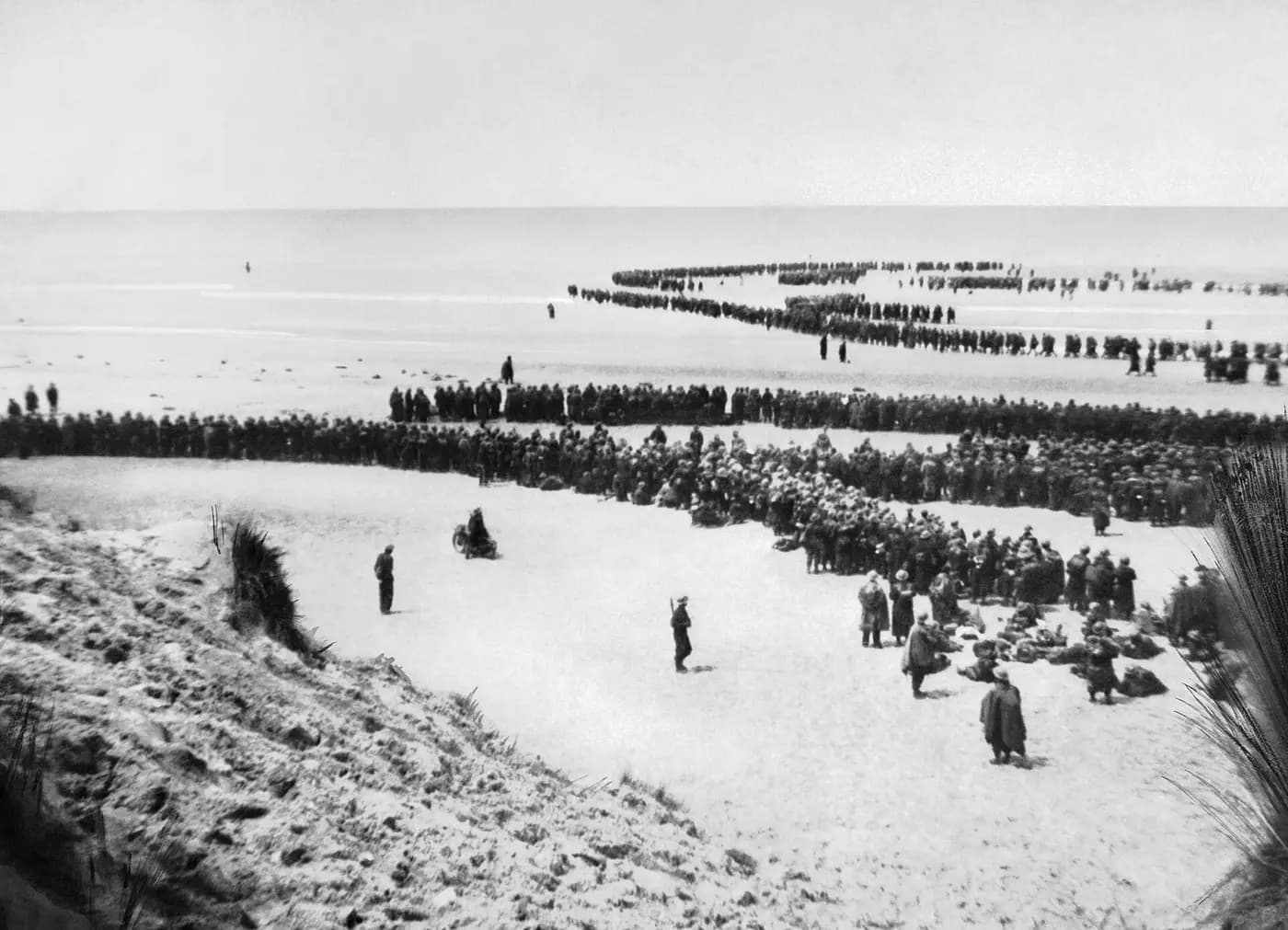 British troops lined up on the beach at Dunkirk, waiting to be evacuated in May 1940
