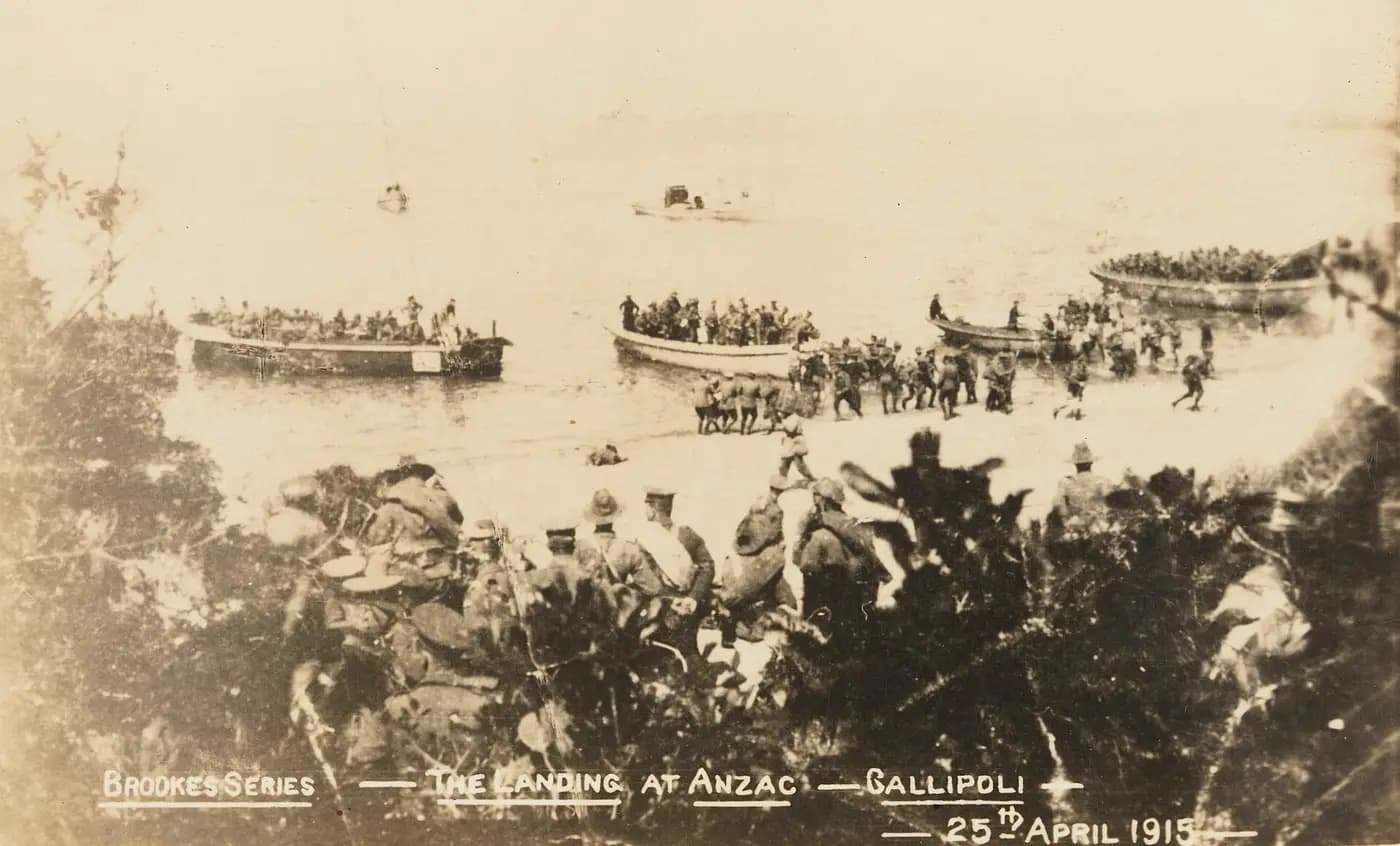 Boats of Australian troops landing at Anzac Cove beneath the cliffs on 25 April 1915