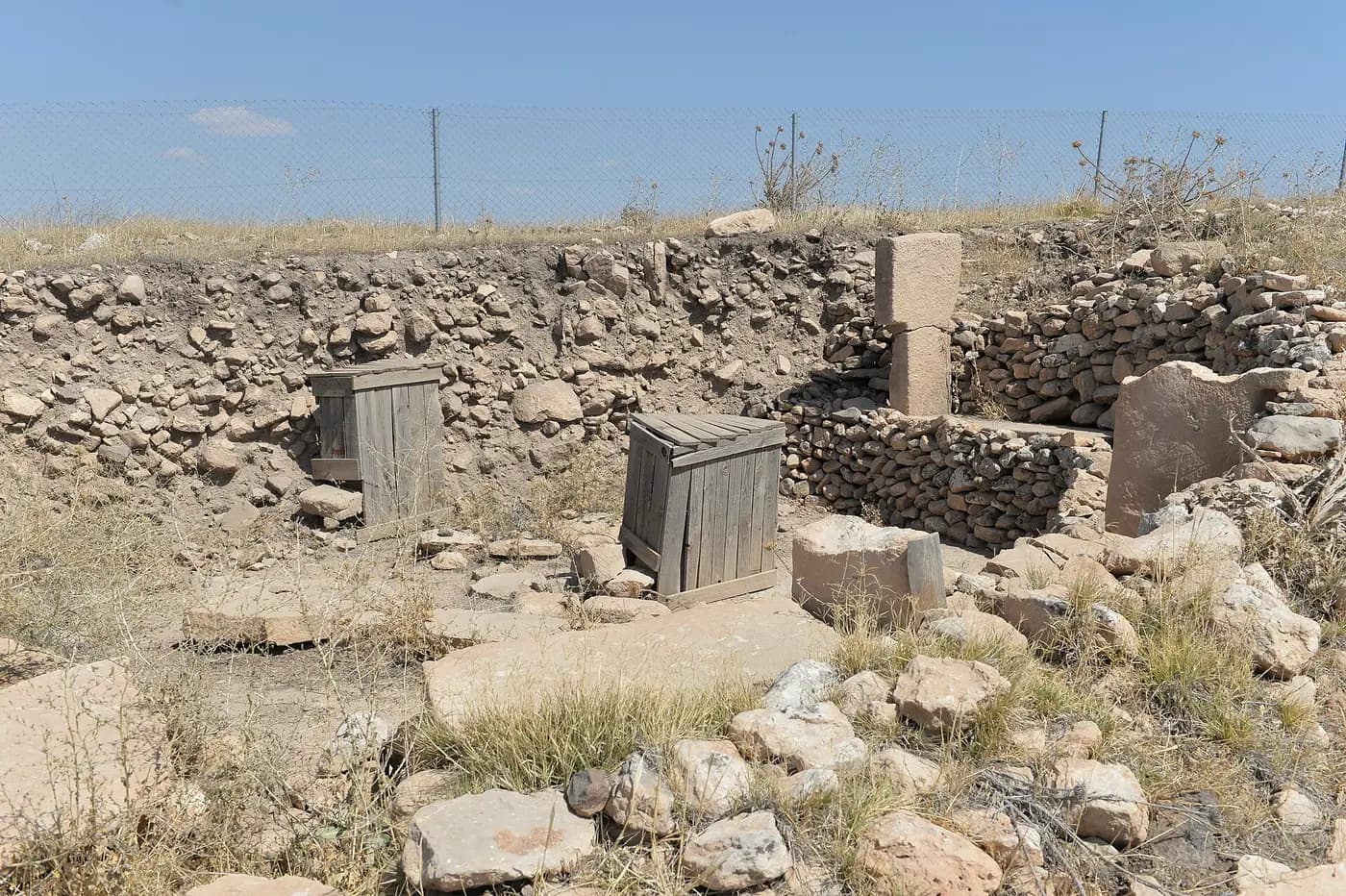 Carved T-shaped stone pillars inside an enclosure at Göbekli Tepe