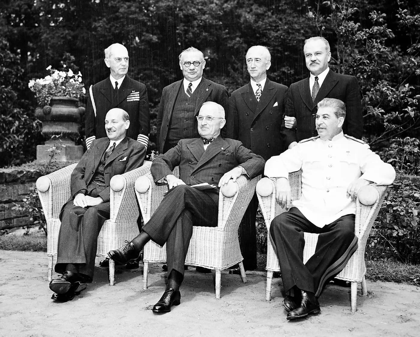 Attlee, Truman and Stalin seated with their advisers in the garden of Cecilienhof Palace, July 1945
