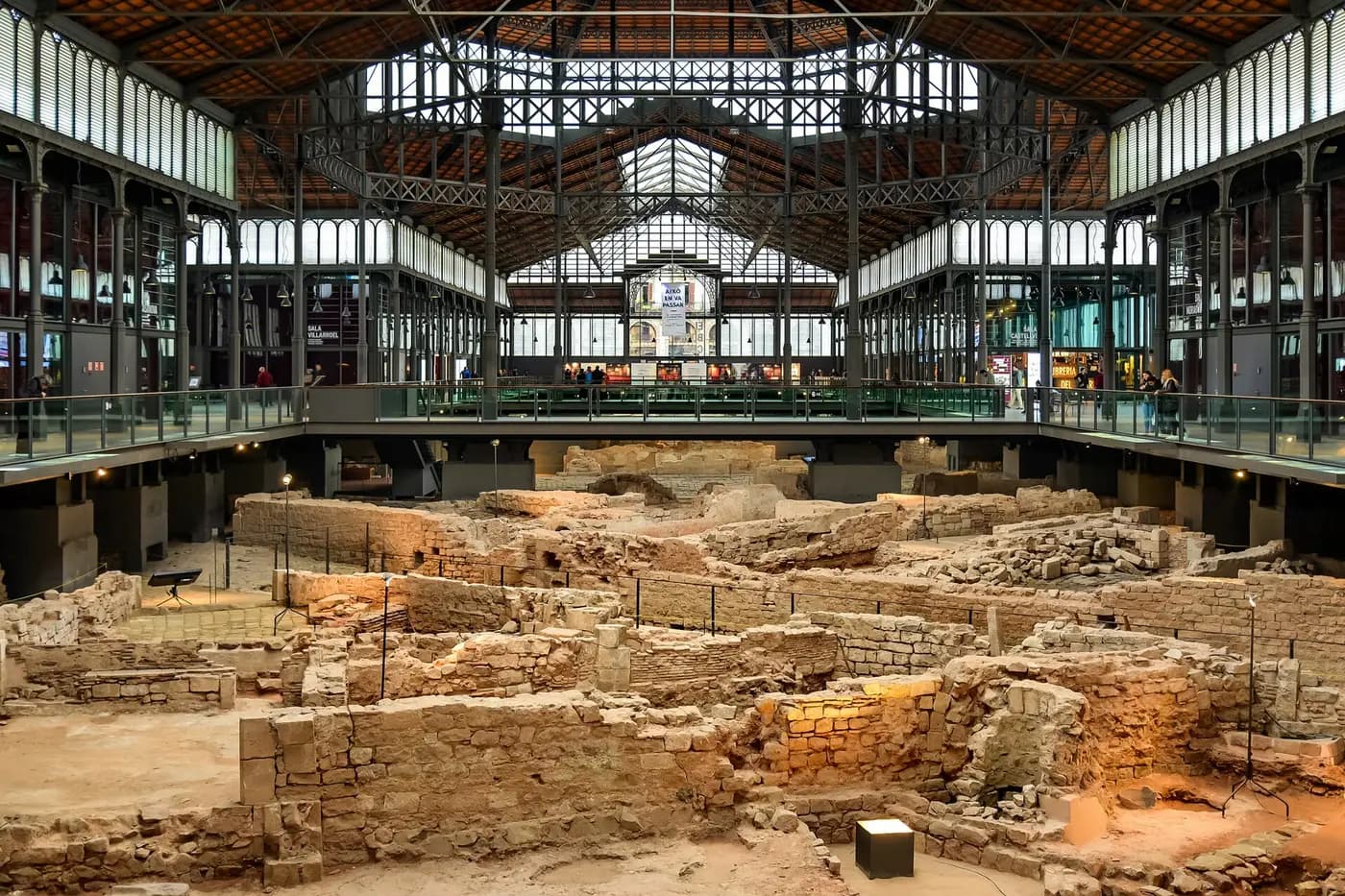 Excavated foundations of the district razed after the 1714 siege, under El Born's iron market roof